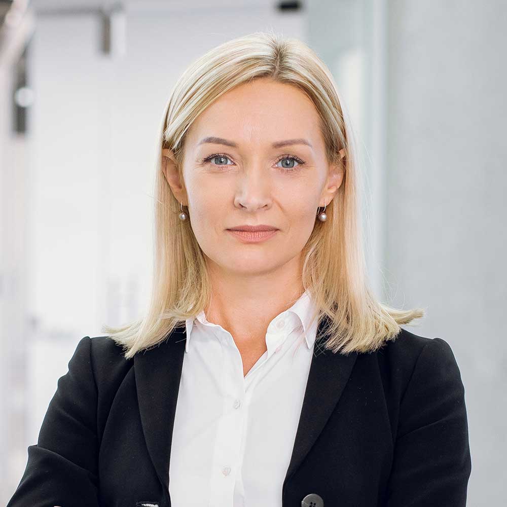indoor office portrait of pretty mature blond busi PAPVH57.jpg